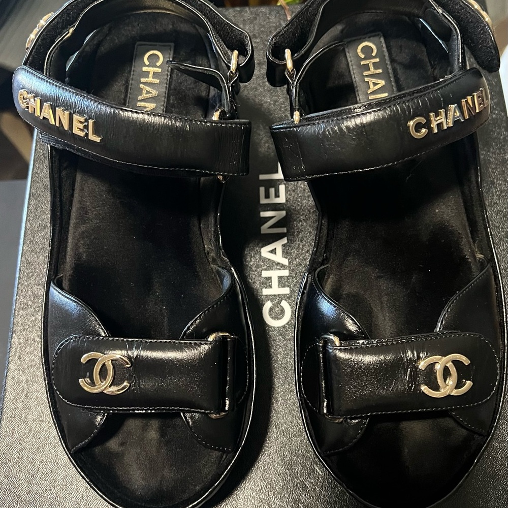 CHANEL Black Sandals with gold Logo